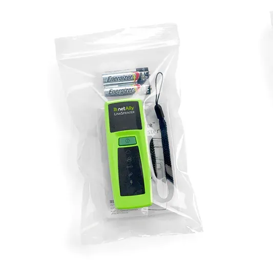 The green NetAlly LinkSprinter 300 in its retail pouch alongside the two AA Energizer batteries it ships with and a wrist lanyard